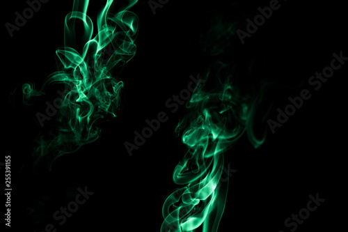 Abstract backgrounds and wallpapers. Colorful smoke on black background..