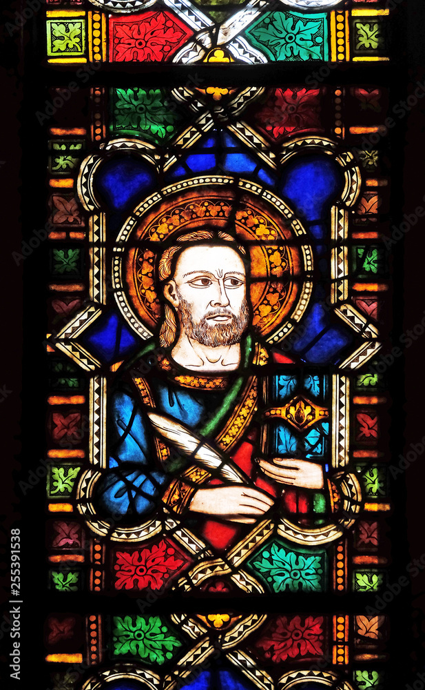 Catholic Saint, stained glass window in the Basilica di Santa Croce (Basilica of the Holy Cross) - famous Franciscan church in Florence, Italy