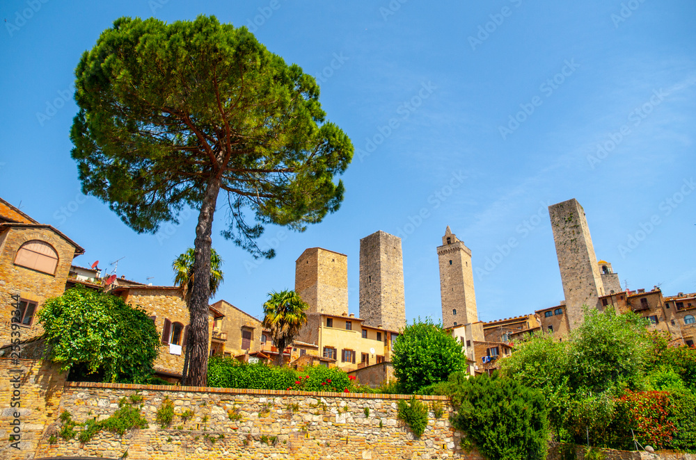 San Gimignano - medieval town with many stone towers, Tuscany, Italy. Panoramic view of cityscape