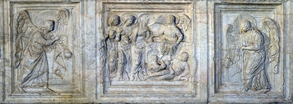 Pious women at the sepulcher and angels, detail of altar in Basilica of Santa Croce (Basilica of the Holy Cross) in Florence, Italy