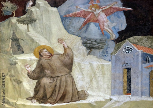 St. Francis Receiving the Stigmata, fresco by Giotto, in the Bardi Chapel of the Basilica di Santa Croce (Basilica of the Holy Cross) in Florence, Italy photo