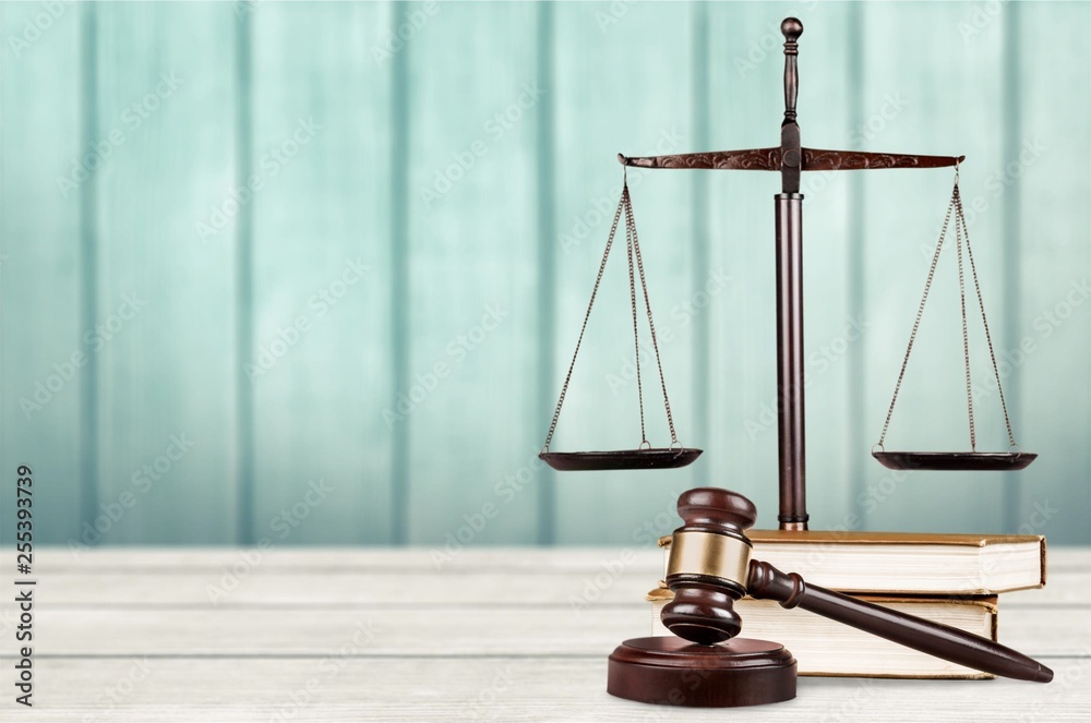 Justice Scales and books and wooden gavel on table. Justice concept Justice Scales and books and wooden gavel on table. Justice concept