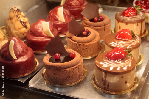 Sweet chocolate and fruit cakes assorted at pastry shop