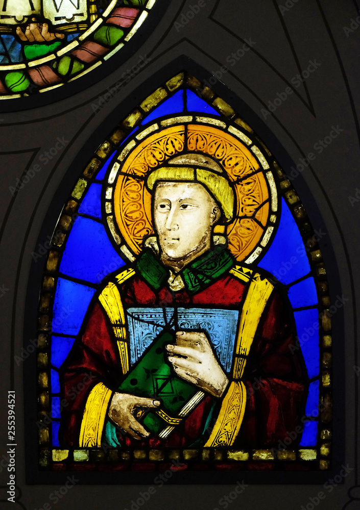 Deacon, stained glass window by Pacino di Buonaguida, Basilica di Santa Croce (Basilica of the Holy Cross) - famous Franciscan church in Florence, Italy