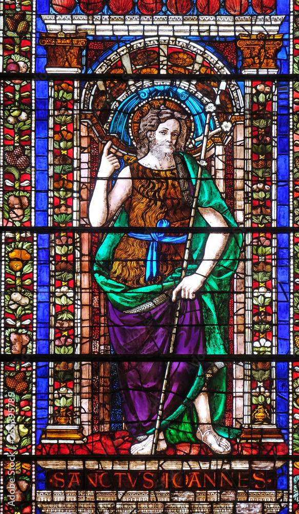 Saint John the Baptist stained glass window in Santa Maria Novella Principal Dominican church in Florence, Italy