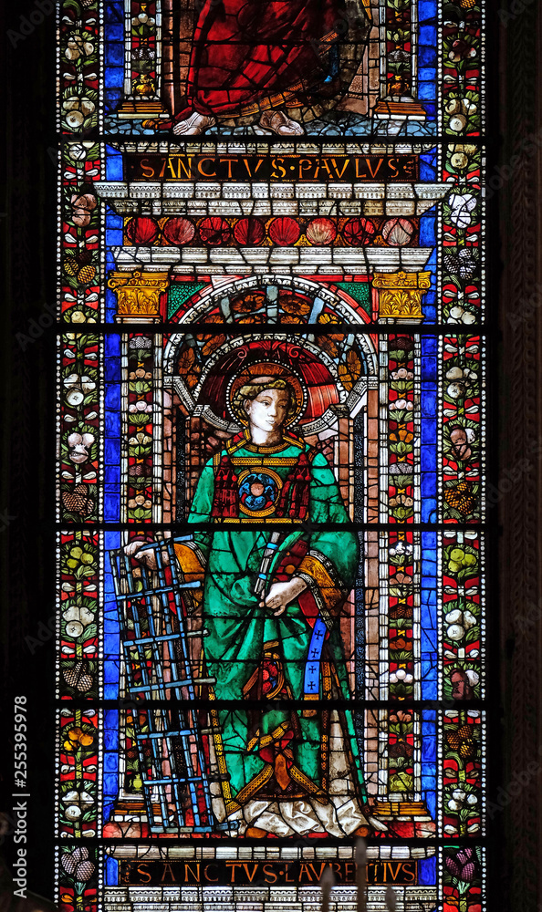 Saint Lawrence of Rome, stained glass window in Santa Maria Novella Principal Dominican church in Florence, Italy
