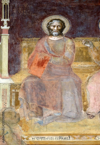 St. Matthew Evangelist, detail of the Triumph of St. Thomas Aquinas, fresco by Andrea di Buonaiuto, Spanish Chapel in Santa Maria Novella church in Florence, Italy photo