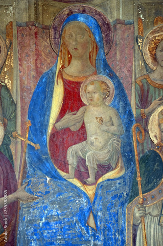 Madonna Enthroned, fresco by Francesco Fiorentino, corner of Via della Scala and Piazza Santa Maria Novella in 1420, in Florence, Italy