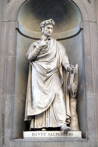 Dante Alighieri in the Niches of the Uffizi Colonnade. The first half of the 19th Century they were occupied by 28 statues of famous people in Florence, Italy photo