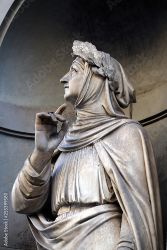 Francesco Petrarca in the Niches of the Uffizi Colonnade. The first half of the 19th Century they were occupied by 28 statues of famous people in Florence, Italy photo