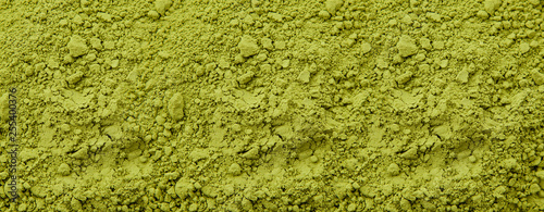 Background texture units chopped green powder closeup.