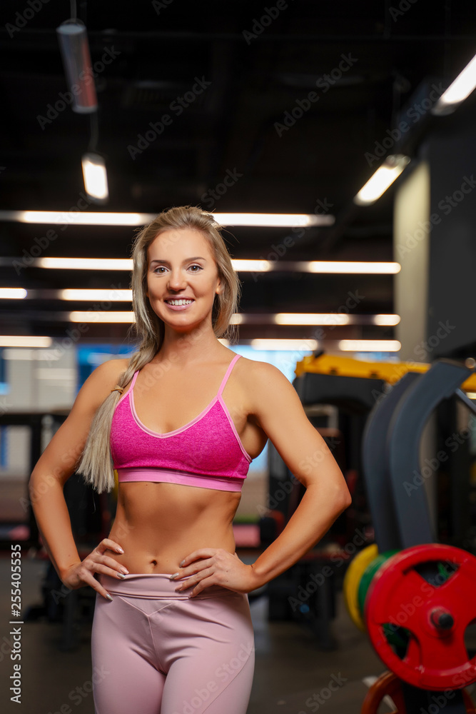 Fototapeta premium Athlete woman with hands on waist.