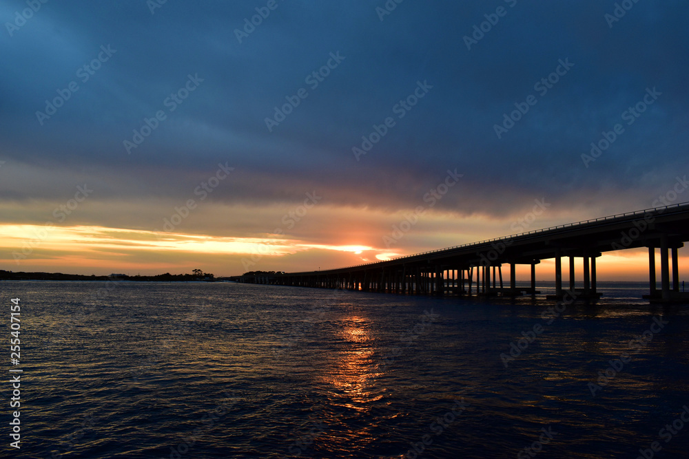 sunset over a bay in florida sunset over a bay in florida