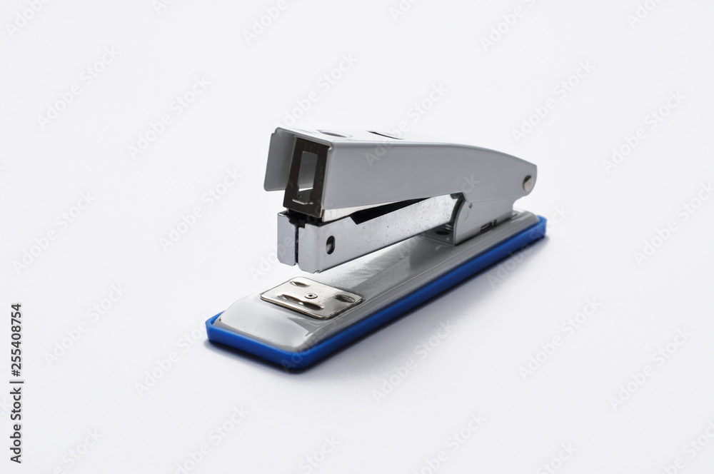 Big silver stapler is isolated on a white background Big silver stapler is isolated on a white background