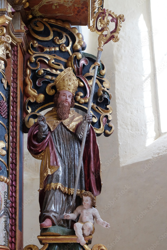 Fototapeta premium St. Augustine of Hippo statue on the main altar in the chapel of St. Wolfgang in Vukovoj, Croatia