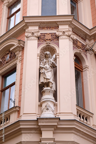 Statue on facade of the old city building in Zagreb  Croatia 