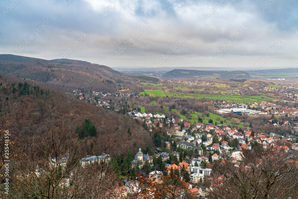 Fototapeta premium Village with hills and clouds