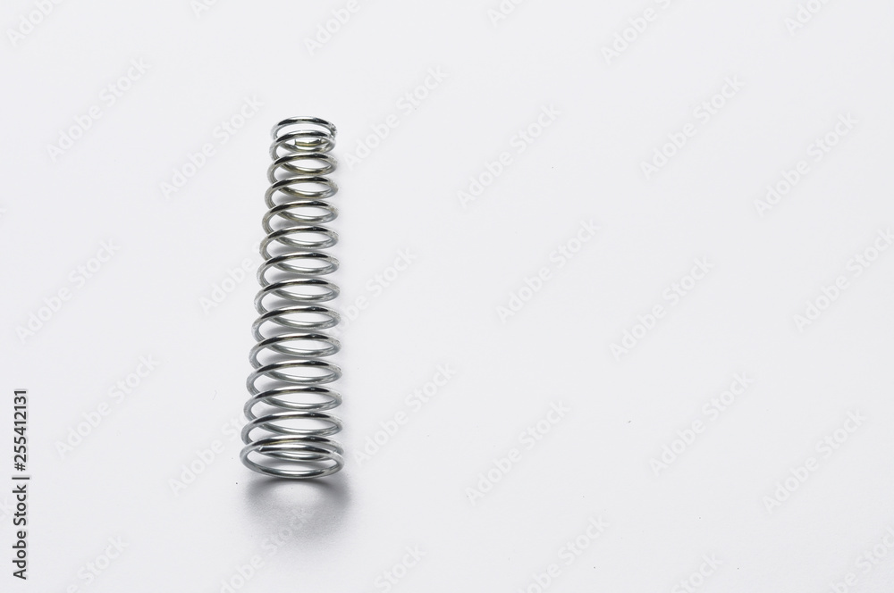 Metal spring isolated on white background