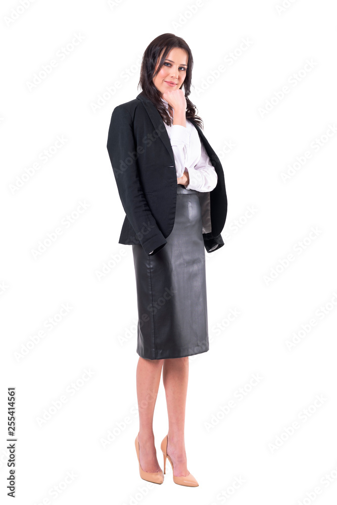 Confident smiling elegant business woman slinging jacket on shoulders looking at camera. Full body isolated on white background. Confident smiling elegant business woman slinging jacket on shoulders looking at camera. Full body isolated on white background.