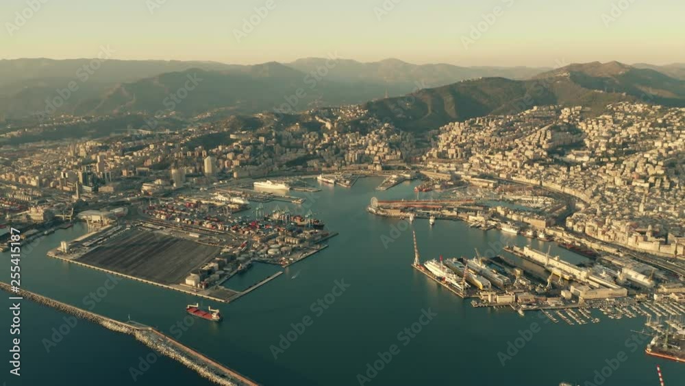 Aerial of seaport and cityscape of Genoa in the evening. Italy Aerial of seaport and cityscape of Genoa in the evening. Italy