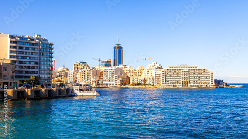 San Giljan, Malta, on January 7, 2019. View of the picturesque bay Spinola and beautiful embankment  photo