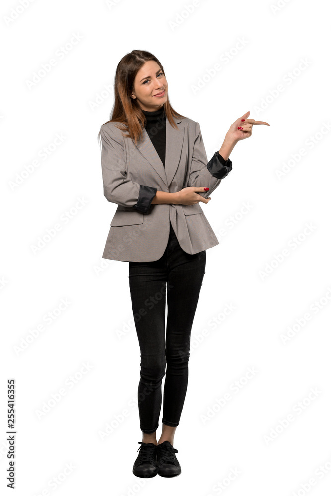 A full-length shot of a Business woman pointing finger to the side over isolated white background A full-length shot of a Business woman pointing finger to the side over isolated white background