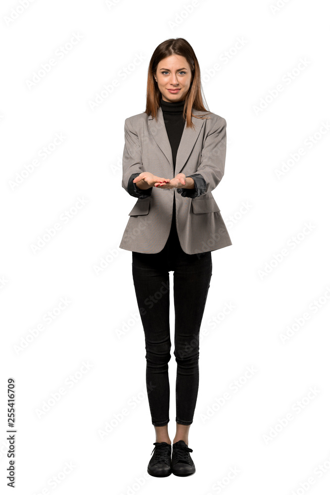 A full-length shot of a Business woman holding copyspace imaginary on the palm to insert an ad over isolated white background A full-length shot of a Business woman holding copyspace imaginary on the palm to insert an ad over isolated white background