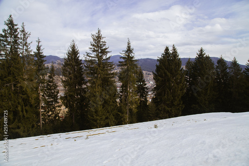 Spring vs winter landscape in the Carpathian mountains