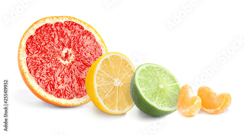 Set of different juicy citrus fruits on white background