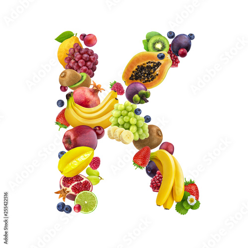 Letter K made of different fruits and berries  fruit font isolated on white background  healthy alphabet