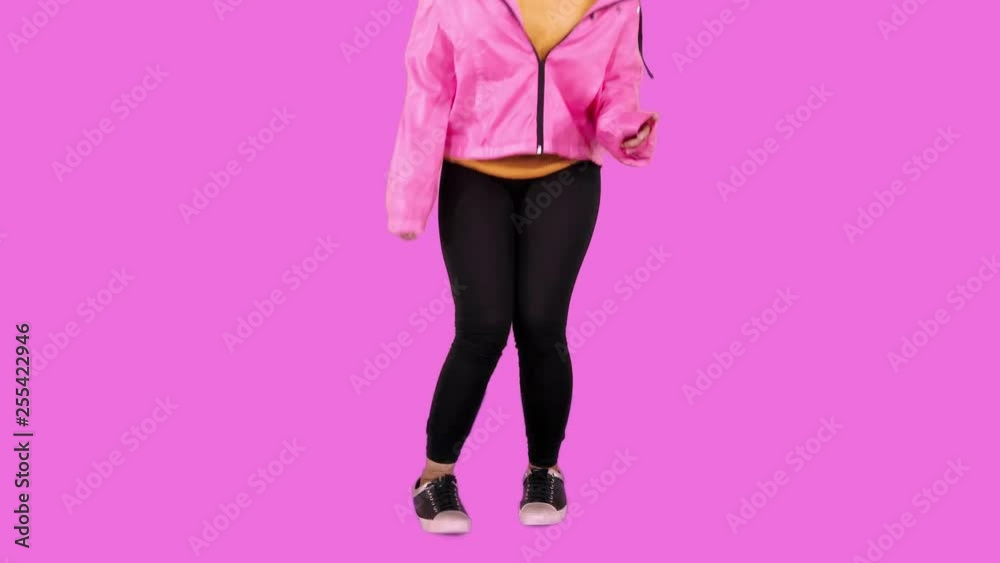 Closeup of young woman foot dancing in the studio with pink background. Shot in 4k resolution Closeup of young woman foot dancing in the studio with pink background. Shot in 4k resolution