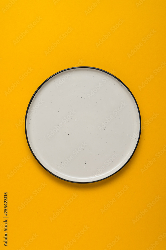 White plate on red background White plate on red background
