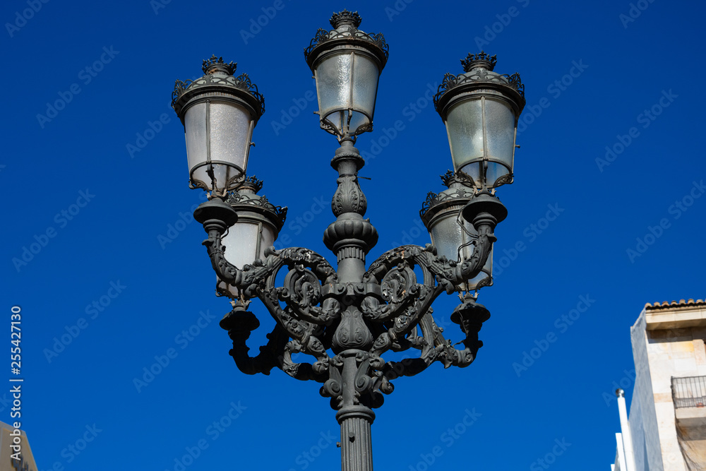 Old street lamp on Valencia street. Valencia, Spain
