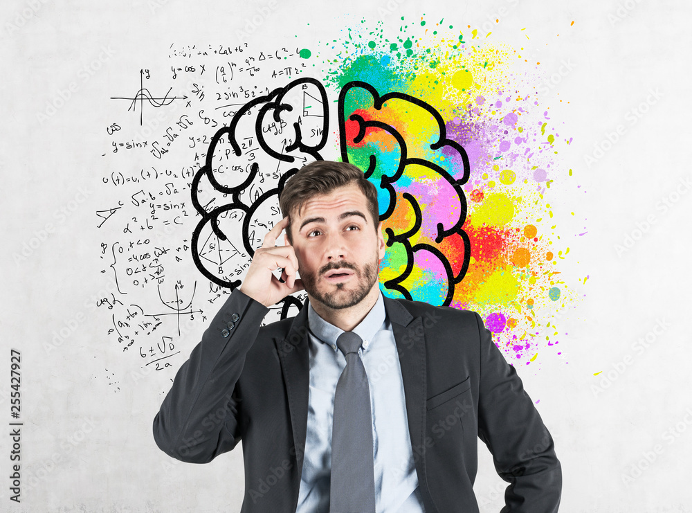 Thoughtful young businessman, brain sketch Thoughtful young businessman, brain sketch