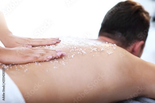 Wallpaper Mural Handsome man having massage in spa salon Torontodigital.ca