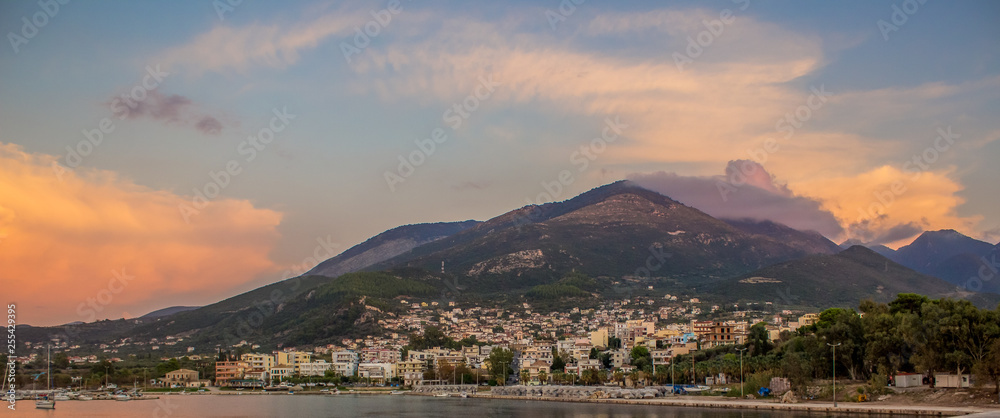 panorama landscape travel photography of island with lonely mountain in Mediterranean south European coast and small village on waterfront district 