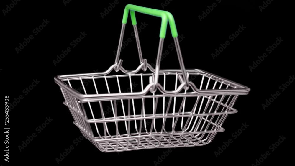 Shopping basket isolated on black background. Video with alpha channel. Looped rotation. Shopping basket isolated on black background. Video with alpha channel. Looped rotation.