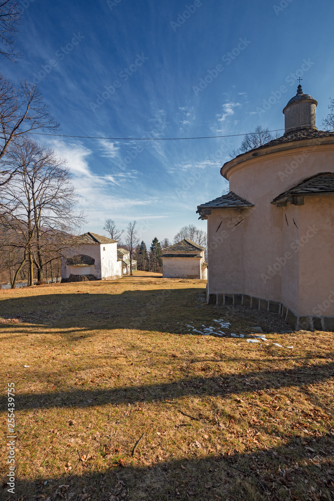 Panoramic view in the afternoon light on a winter day, of the seventeenth-century chapels of the monumental complex dedicated to the Virgin Mary, of the Sanctuary of Oropa in Piedmont, Italy.