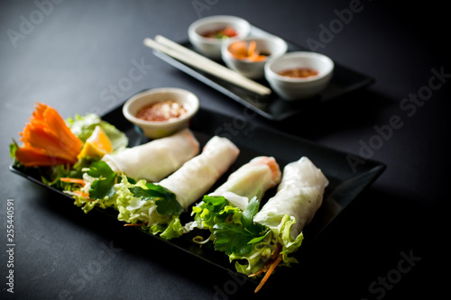 Spring rolls with vegetables in noodle tube. Vegetables in rice noodle tube photo