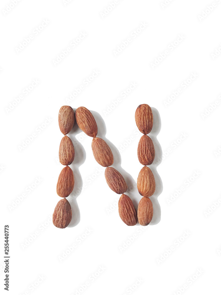 Isolated alphabet letter N made by almonds Isolated alphabet letter N made by almonds