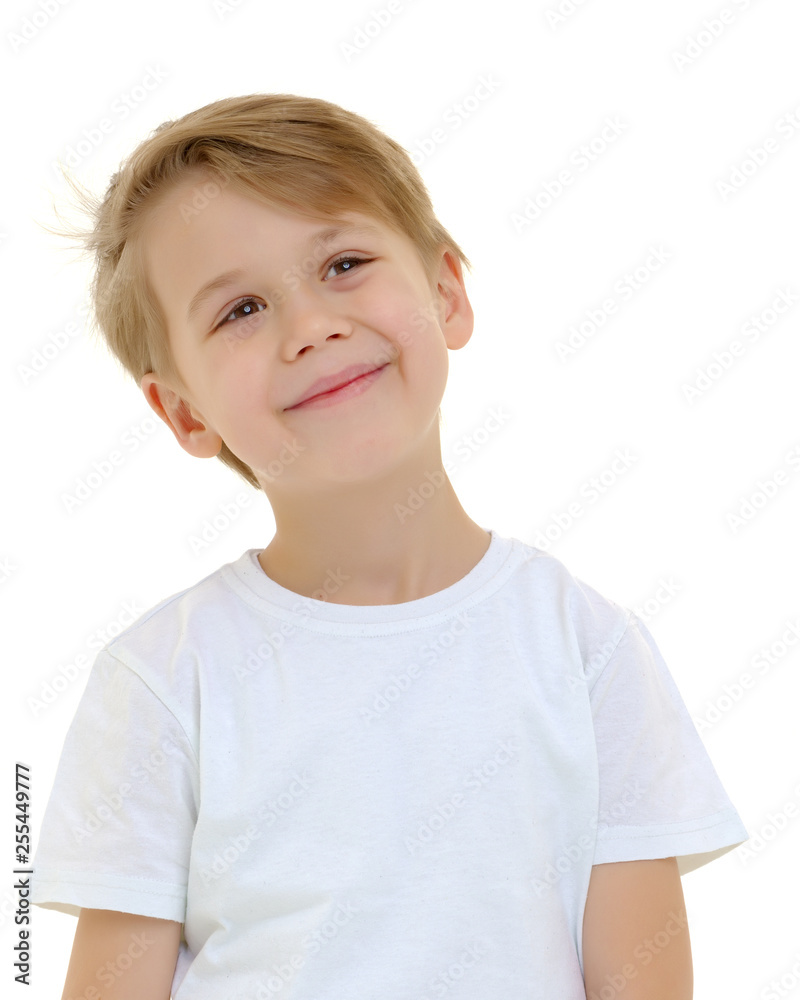 Emotional little boy in a pure white t-shirt.