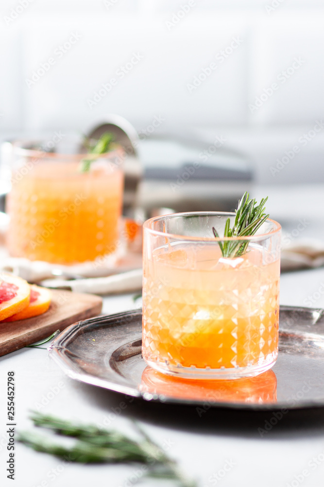 Cocktail with grapefruit juice and rosemary Cocktail with grapefruit juice and rosemary