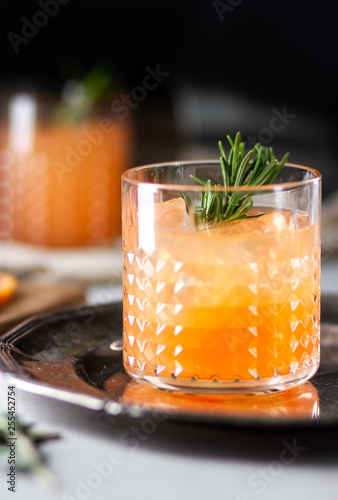 Cocktail with grapefruit juice and rosemary