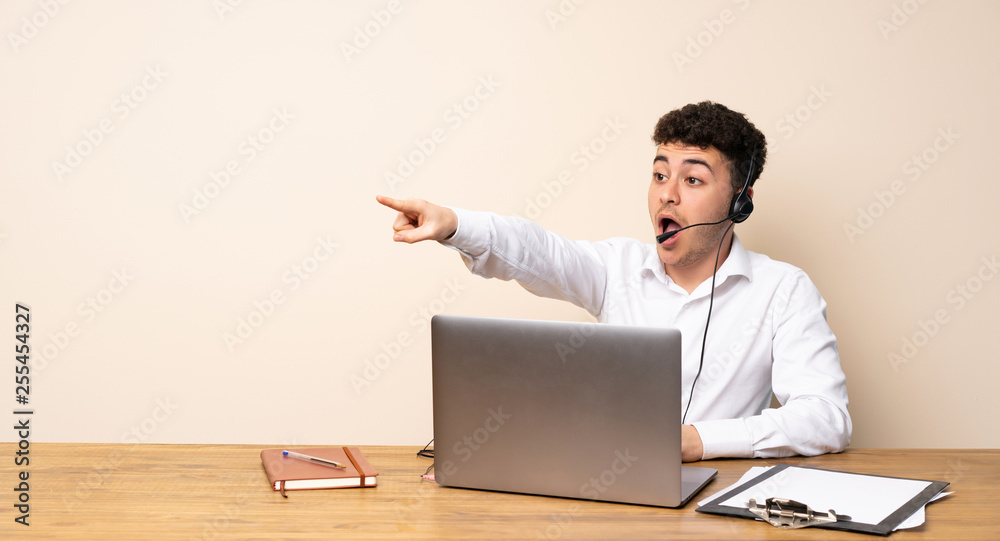 Telemarketer man pointing away Telemarketer man pointing away