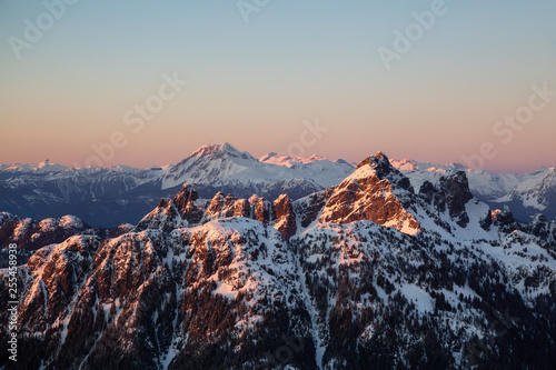 Aerial view of Canadian Mountain Landscape during a vibrant sunset. Taken near Squamish, North of Vancouver, British Columbia, Canada. © edb3_16