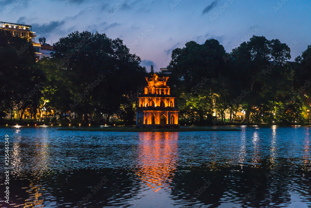 Illuminated Turtle Tower in Hoan Kiem Lake in the historical centre, Hanoi, Vietnam