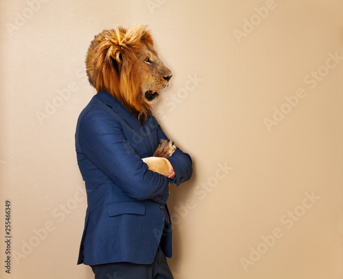 Male lion in office clothing suit and shirt