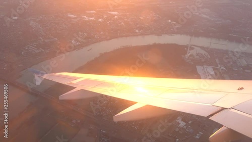 Flight over Cologne and Leverkusen with the sun reflection at the wing photo