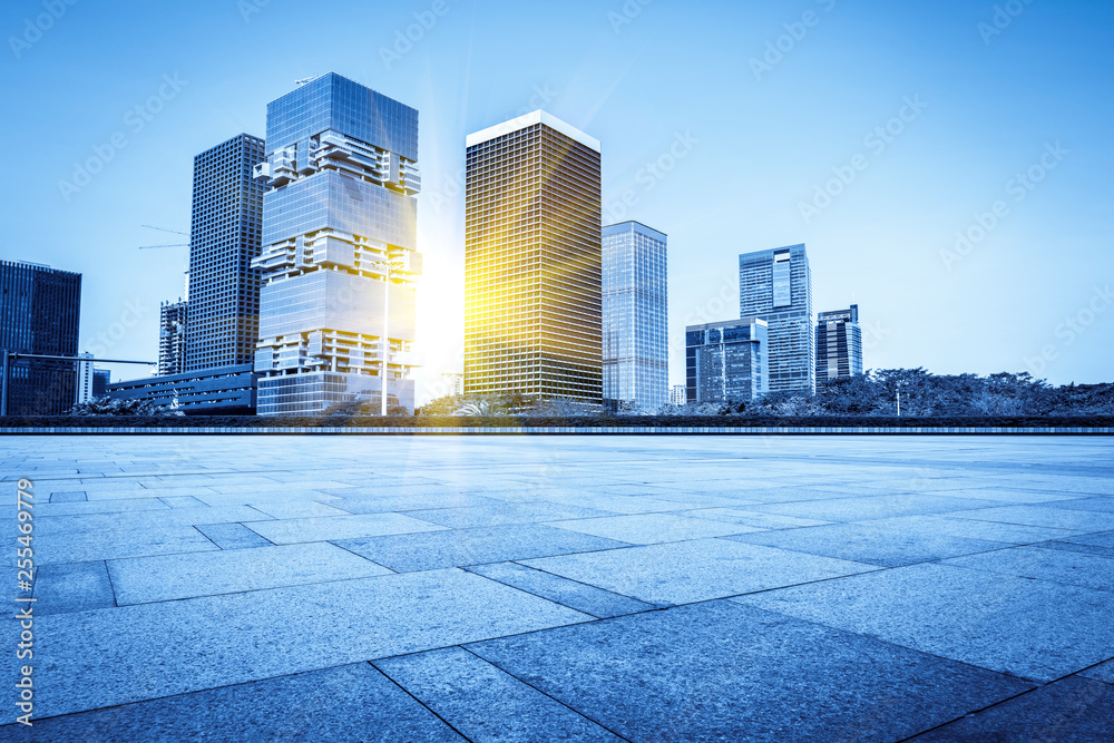 Urban skyscrapers with empty square floor tiles Urban skyscrapers with empty square floor tiles