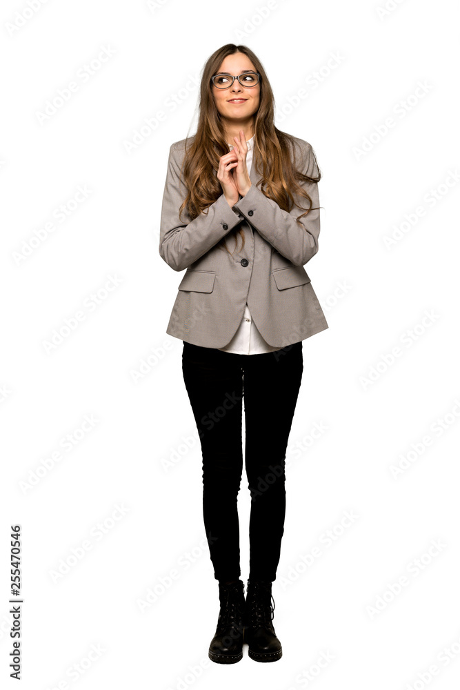 Full-length shot of Business woman scheming something on isolated white background